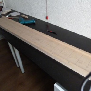 De bouwplank.